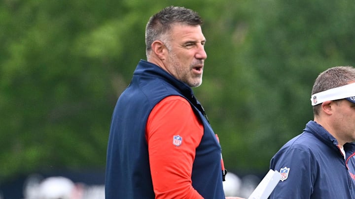 Jun 9, 2025; Foxborough, MA, USA; New England Patriots head coach Mike Vrabel (L) and offensive coordinator Josh McDaniels (R) watch over practice during minicamp at Gillette Stadium. Mandatory Credit: Eric Canha-Imagn Images