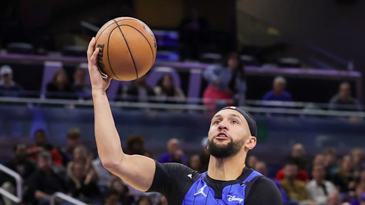 Orlando Magic guard Jalen Suggs is fouled by Detroit Pistons guard Marcus Sasser.