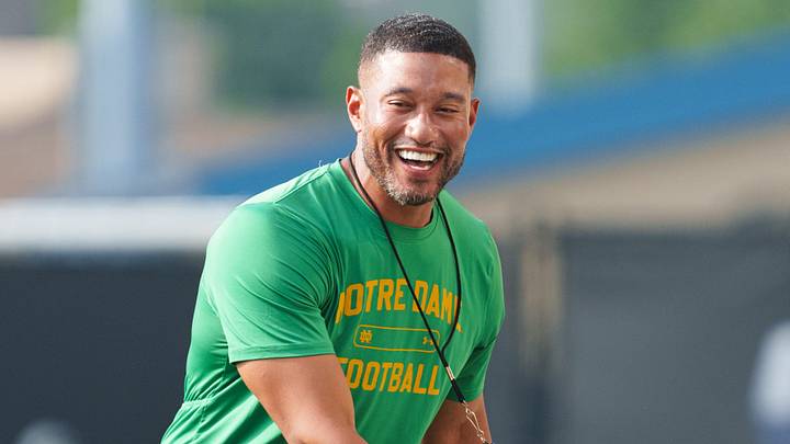 Head coach Marcus Freeman shakes hands with one of his players during a Notre Dame football practice at Irish Athletic Center on Saturday, Aug. 8, 2026, in South Bend.