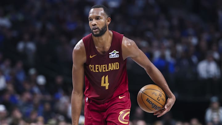 Jan 3, 2025; Dallas, Texas, USA;  Cleveland Cavaliers forward Evan Mobley (4) dribbles during the first half against the Dallas Mavericks at American Airlines Center. Mandatory Credit: Kevin Jairaj-Imagn Images