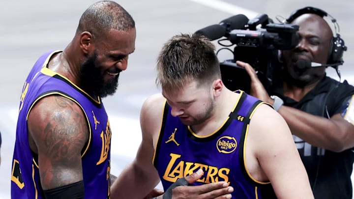 Apr 9, 2025; Dallas, Texas, USA;  Los Angeles Lakers forward LeBron James (23) celebrates with Los Angeles Lakers guard Luka Doncic (77) during the fourth quarter against the Dallas Mavericks at American Airlines Center. Mandatory Credit: Kevin Jairaj-Imagn Images