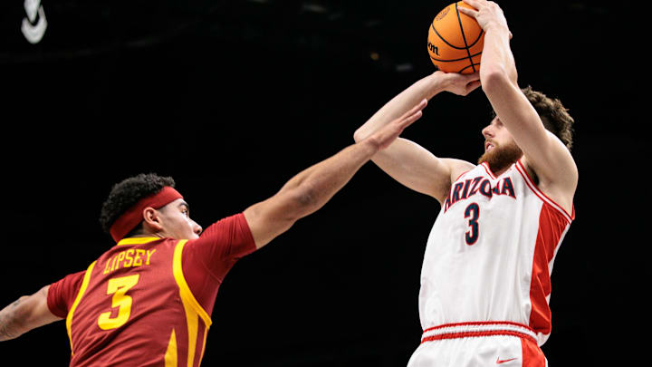 Mar 13, 2026; Kansas City, MO, USA; Arizona Wildcats guard Anthony Dell'orso (3) shoots the ball over Iowa State Cyclones guard Tamin Lipsey (3) during the first half at T-Mobile Center. Mandatory Credit: William Purnell-Imagn Images