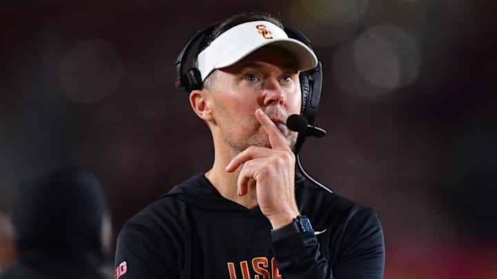 Nov 7, 2025; Los Angeles, California, USA; Southern California Trojans head coach Lincoln Riley watches game action against the Northwestern Wildcats during the second half at the Los Angeles Memorial Coliseum. Mandatory Credit: Gary A. Vasquez-Imagn Images