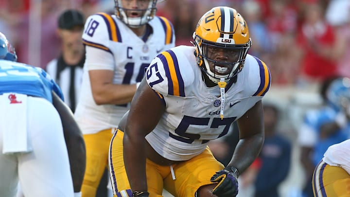LSU Tigers offensive lineman Carius Curne (57) waits for the snap during the fourth quarter against the Ole Miss Rebels at Vaught-Hemingway Stadium in Oxford, Miss.
