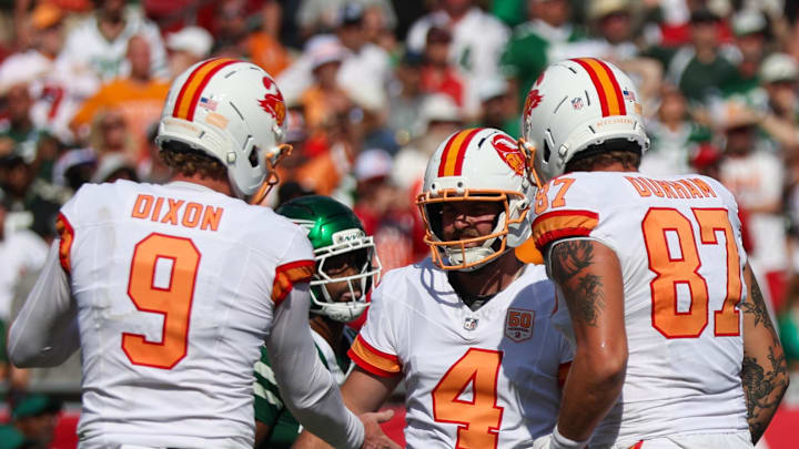 Tampa Bay Buccaneers kicker Chase McLaughlin (4) reacts with punter Riley Dixon (9) and tight end Payne Durham (87) after making a field goal vs. the New York Jets