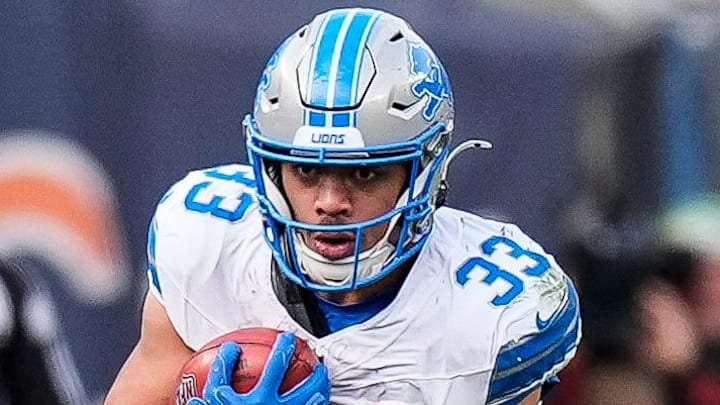 Detroit Lions running back Sione Vaki (33).