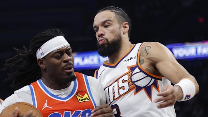 Nov 28, 2025; Oklahoma City, Oklahoma, USA; Oklahoma City Thunder guard Luguentz Dort (5) drives to the basket against Phoenix Suns forward Dillon Brooks (3) during the second half at Paycom Center. Mandatory Credit: Alonzo Adams-Imagn Images Nov 28, 2025; Oklahoma City, Oklahoma, USA; Oklahoma City Thunder guard Luguentz Dort (5) drives to the basket against Phoenix Suns forward Dillon Brooks (3) during the second half at Paycom Center. Mandatory Credit: Alonzo Adams-Imagn Images