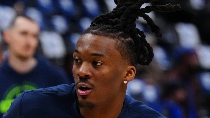 Apr 20, 2026; Denver, Colorado, USA; Minnesota Timberwolves guard Bones Hyland (8) warms up before game two of the first round of the 2026 NBA Playoffs against the Denver Nuggets at Ball Arena. Mandatory Credit: Ron Chenoy-Imagn Images