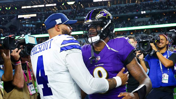 Dallas Cowboys quarterback Dak Prescott hugs Baltimore Ravens quarterback Lamar Jackson after the game at AT&T Stadium. Dallas Cowboys quarterback Dak Prescott hugs Baltimore Ravens quarterback Lamar Jackson after the game at AT&T Stadium.