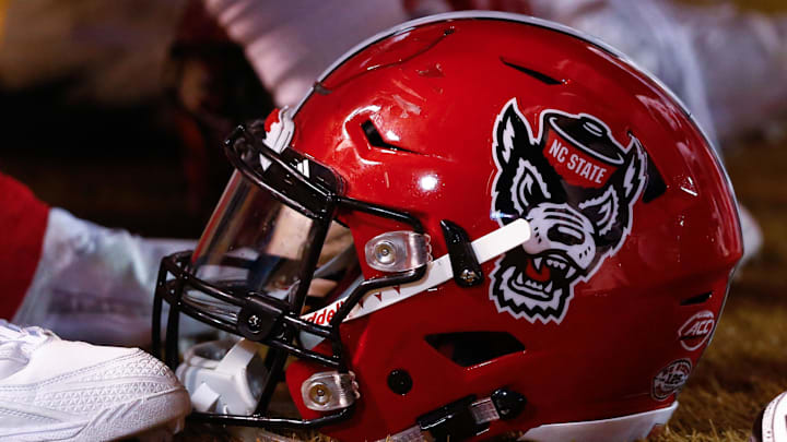 Nov 18, 2017; Winston-Salem, NC, USA; A North Carolina State Wolfpack helmet lays on the sidelines during the game against the Wake Forest Demon Deacons at BB&T Field. Mandatory Credit: Jeremy Brevard-Imagn Images