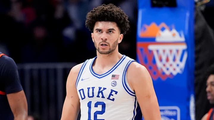 Mar 14, 2026; Charlotte, NC, USA; Duke Blue Devils forward Cameron Boozer (12) celebrates after a play against the Virginia Cavaliers during the men's ACC Conference Tournament Championship at Spectrum Center. Mandatory Credit: Jim Dedmon-Imagn Images Mar 14, 2026; Charlotte, NC, USA; Duke Blue Devils forward Cameron Boozer (12) celebrates after a play against the Virginia Cavaliers during the men's ACC Conference Tournament Championship at Spectrum Center. Mandatory Credit: Jim Dedmon-Imagn Images
