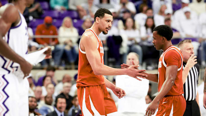 Feb 3, 2024; Fort Worth, Texas, USA;  Texas Longhorns guard Max Abmas (3) celebrates with Texas Longhorns forward Dylan Disu (1).