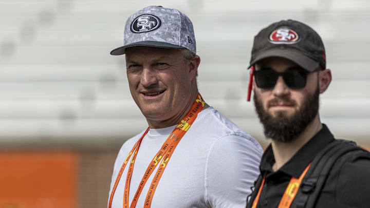 Jan 29, 2025; Mobile, AL, USA; San Francisco 49ers general manager John Lynch watches drills with San Francisco 49ers director of player personnel RJ Gillen during Senior Bowl practice for the American team at Hancock Whitney Stadium. Mandatory Credit: Vasha Hunt-Imagn Images