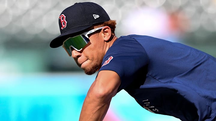 Boston Red Sox second baseman Kristian Campbell (28) fields the ball at first base during warmups before a game against the Atlanta Braves at Fenway Park.