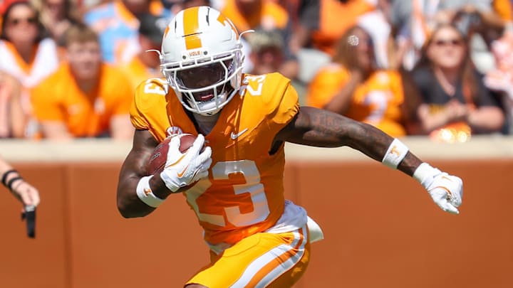Sep 20, 2025; Knoxville, Tennessee, USA;  Tennessee Volunteers defensive back Boo Carter (23) returns a punt against the UAB Blazers during the first quarter at Neyland Stadium. Mandatory Credit: Randy Sartin-Imagn Images