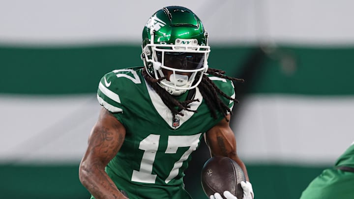 Jan 5, 2025; East Rutherford, New Jersey, USA; New York Jets wide receiver Davante Adams (17) gains yards after catch during the first quarter against the Miami Dolphins at MetLife Stadium. Mandatory Credit: Vincent Carchietta-Imagn Images