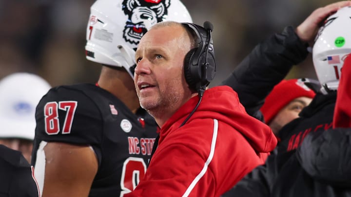 Nov 21, 2024; Atlanta, Georgia, USA; North Carolina State Wolfpack head coach Dave Doeren on the sideline against the Georgia Tech Yellow Jackets in the fourth quarter at Bobby Dodd Stadium at Hyundai Field. Mandatory Credit: Brett Davis-Imagn Images