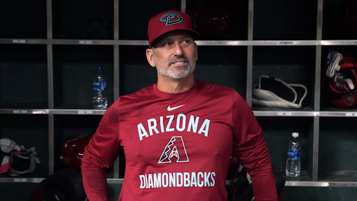 Aug 20, 2025; Phoenix, Arizona, USA; Arizona Diamondbacks manager Torey Lovullo (17) sits in the dugout after defeating the Cleveland Guardians at Chase Field. Mandatory Credit: Rick Scuteri-Imagn Images