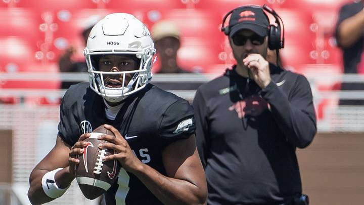 Arkansas Razorbacks coach Ryan Silverfield watches quarterback KJ Jackson (7) roll out to pass during the spring game at Razorback Stadium. Arkansas Razorbacks coach Ryan Silverfield watches quarterback KJ Jackson (7) roll out to pass during the spring game at Razorback Stadium.