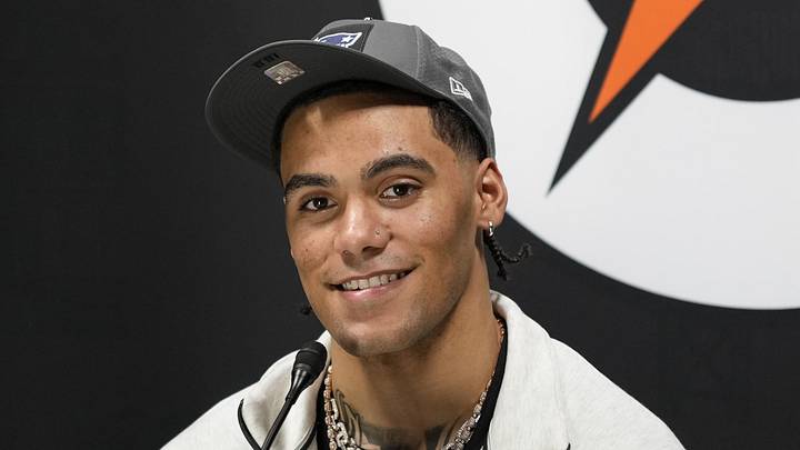 New England Patriots cornerback Christian Gonzalez (0).