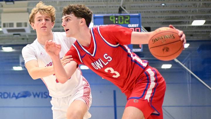 Slinger guard Jack Kohnen (3) drives to the basket past Arrowhead guard Thomas Toepel (23) in the Rick Majerus WBY Shootout on Saturday, December 27, 2025, at Concordia University in Mequon, Wisconsin. Slinger won, 71-69. Slinger guard Jack Kohnen (3) drives to the basket past Arrowhead guard Thomas Toepel (23) in the Rick Majerus WBY Shootout on Saturday, December 27, 2025, at Concordia University in Mequon, Wisconsin. Slinger won, 71-69.
