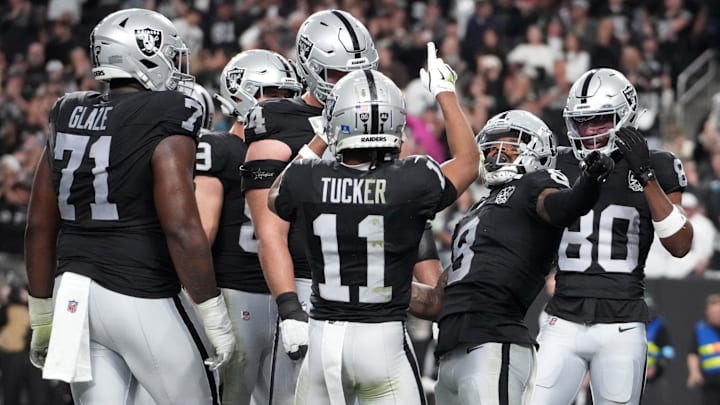 Dec 22, 2024; Paradise, Nevada, USA; Las Vegas Raiders running back Ameer Abdullah (8) celebrates with wide receiver Tre Tucker (11) and wide receiver Terrace Marshall Jr. (80) after scoring on a 7-yard touchdown run in the second half against the Jacksonville Jaguars at Allegiant Stadium. Mandatory Credit: Kirby Lee-Imagn Images Dec 22, 2024; Paradise, Nevada, USA; Las Vegas Raiders running back Ameer Abdullah (8) celebrates with wide receiver Tre Tucker (11) and wide receiver Terrace Marshall Jr. (80) after scoring on a 7-yard touchdown run in the second half against the Jacksonville Jaguars at Allegiant Stadium. Mandatory Credit: Kirby Lee-Imagn Images