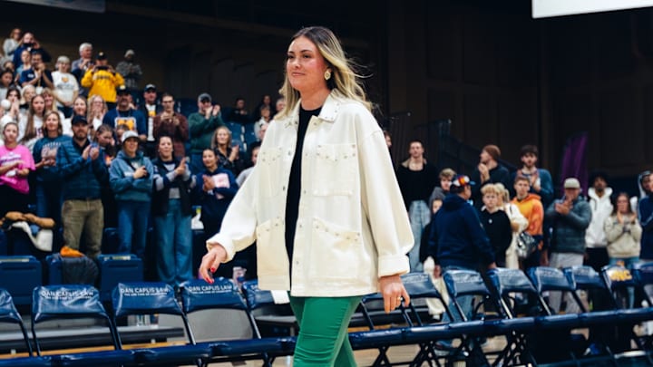 Northern Colorado assistant coach Jadyn (McCartney) Lamb walks the sidelines before a match last season. Lamb will return to her hometown of Chadron this weekend as UNC plays a spring exhibition against Nebraska on Saturday.