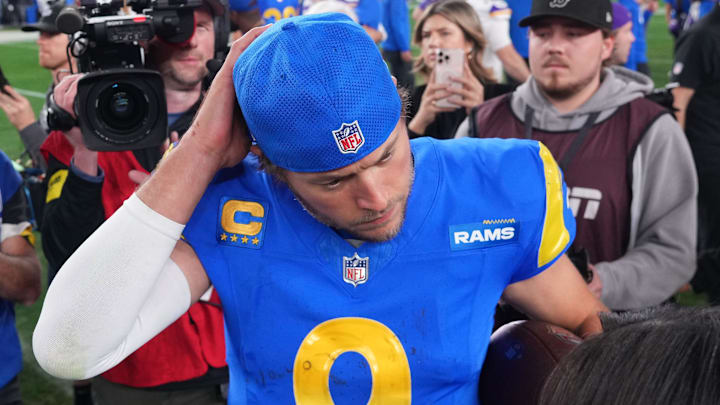 Jan 13, 2025; Glendale, AZ, USA; Los Angeles Rams quarterback Matthew Stafford (9) speaks to the media after the NFC wild card game against the Minnesota Vikings at State Farm Stadium. Mandatory Credit: Joe Camporeale-Imagn Images