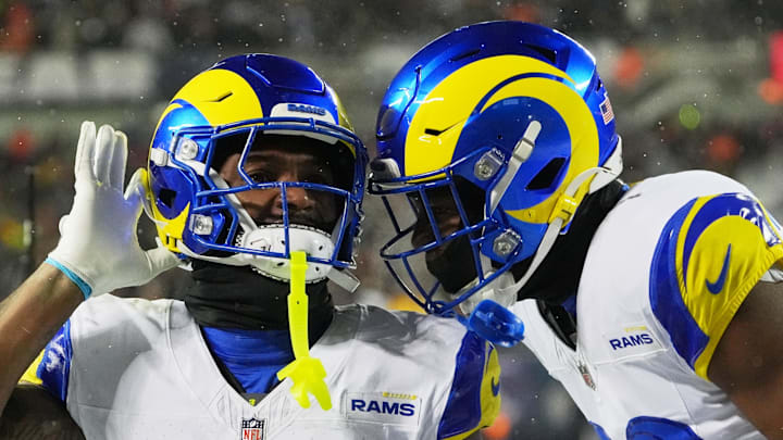 Jan 18, 2026; Chicago, IL, USA; Los Angeles Rams safety Kam Curl (3) acknowledges the crowd with safety Kamren Kinchens (26) after intercepting a pass intended for Chicago Bears wide receiver DJ Moore (not pictured) during overtime of an NFC Divisional Round game at Soldier Field. Mandatory Credit: David Banks-Imagn Images