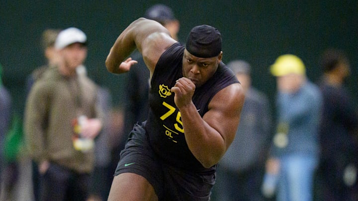Oregon offensive lineman Emmanuel Pregnon runs drills during Oregon Pro Day on March 17, 2026, at the Moshofsky Center in Eugene, Oregon.