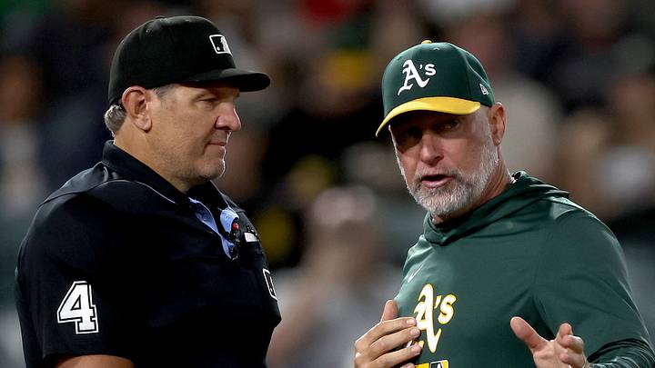 Sep 7, 2026; West Sacramento, California, USA; Athletics manager Mark Kotsay (7) talks with home plate umpire Chad Fairchild (4) during the fourth inning against the Toronto Blue Jays at Sutter Health Park. Mandatory Credit: Dennis Lee-Imagn Images Sep 7, 2026; West Sacramento, California, USA; Athletics manager Mark Kotsay (7) talks with home plate umpire Chad Fairchild (4) during the fourth inning against the Toronto Blue Jays at Sutter Health Park. Mandatory Credit: Dennis Lee-Imagn Images