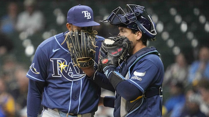 Mar 31, 2026; Milwaukee, Wisconsin, USA; Tampa Bay Rays catcher Nick Fortes (40) talks with Tampa Bay Rays pitcher Yoendrys Gomez (94) in the seventh inning against the Milwaukee Brewers at American Family Field. 