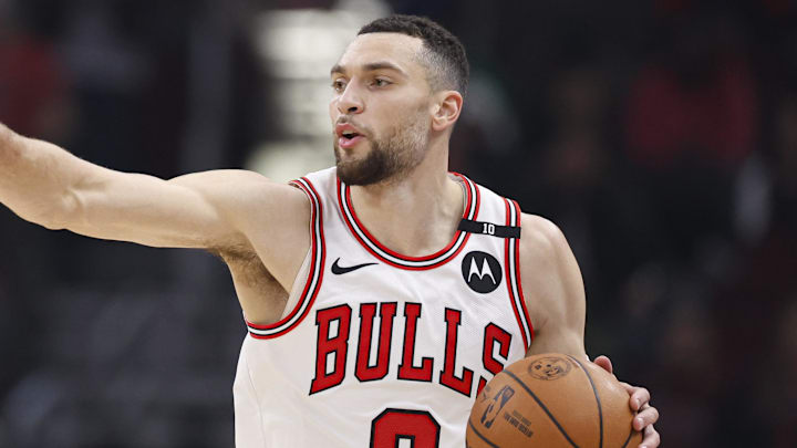 Jan 10, 2025; Chicago, Illinois, USA; Chicago Bulls guard Zach LaVine (8) brings the ball up court against the Washington Wizards during the first half at United Center. Mandatory Credit: Kamil Krzaczynski-Imagn Images