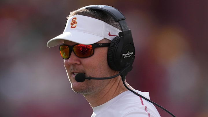 Nov 30, 2024; Los Angeles, California, USA; Southern California Trojans head coach Lincoln Riley reacts against the Notre Dame Fighting Irish in the second half at United Airlines Field at Los Angeles Memorial Coliseum. Mandatory Credit: Kirby Lee-Imagn Images