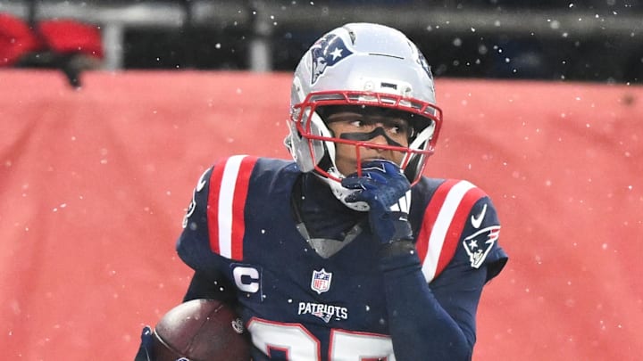 Jan 18, 2026; Foxborough, MA, USA; New England Patriots cornerback Marcus Jones (25) reacts after scoring a touchdown in the second quarter against the Houston Texans in an AFC Divisional Round game at Gillette Stadium. Mandatory Credit: Brian Fluharty-Imagn Images