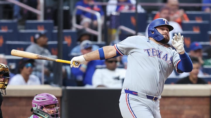 Texas Rangers pinch hitter Rowdy Tellez (44) hits an RBI double in the eighth inning against the New York Mets. Texas Rangers pinch hitter Rowdy Tellez (44) hits an RBI double in the eighth inning against the New York Mets.