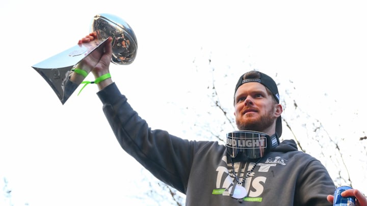 Feb 11, 2026; Seattle, WA, USA; Seattle Seahawks quarterback Sam Darnold (14) interacts with fans during the Super Bowl LX World Champions parade in downtown Seattle. Mandatory Credit: Steven Bisig-Imagn Images