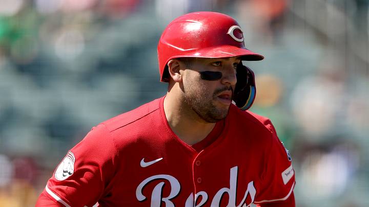 Cincinnati Reds catcher Jose Trevino (35) runs to first base
