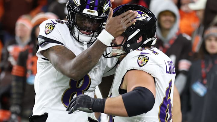 Baltimore Ravens quarterback Lamar Jackson (8) and center Tyler Linderbaum (64) celebrate a touchdown Baltimore Ravens quarterback Lamar Jackson (8) and center Tyler Linderbaum (64) celebrate a touchdown