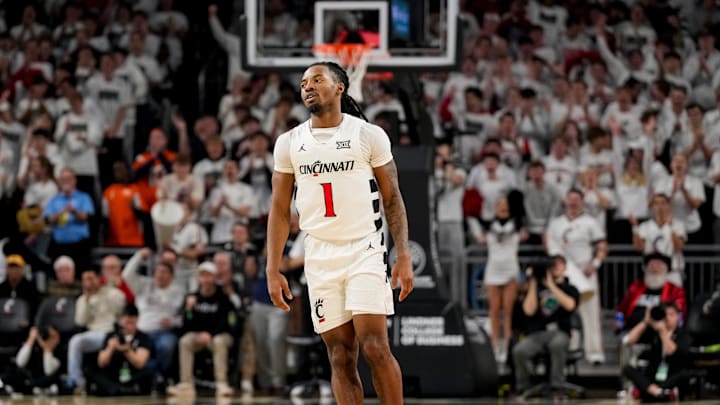 Cincinnati Bearcats guard Day Day Thomas (1) drops back on defense after scoring from three point range in the second half of the NCAA Big 12 basketball game between the Cincinnati Bearcats and the Iowa State Cyclones at Fifth Third Stadium in Cincinnati on Saturday, Jan. 17, 2026. The Bearcats upset the No. 2 Cyclones, winning 79-70.