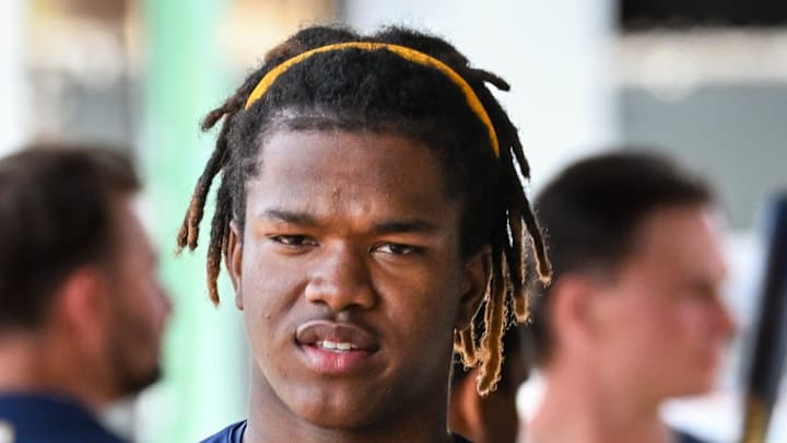 Milwaukee Brewers shortstop prospect Jesus Made walks in the dugout during spring training workouts Monday, February 17, 2025, at American Family Fields of Phoenix in Phoenix, Arizona.