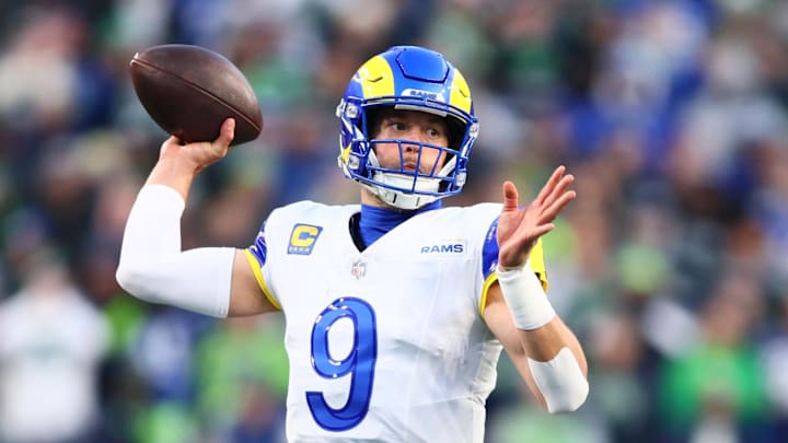 Jan 25, 2026; Seattle, WA, USA; Los Angeles Rams quarterback Matthew Stafford (9) passes against the Seattle Seahawks during the first half in the 2026 NFC Championship Game at Lumen Field. Mandatory Credit: Kevin Ng-Imagn Images