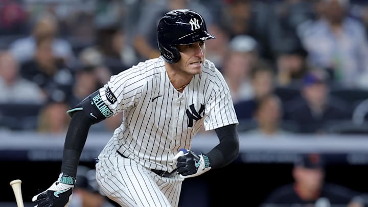 Sep 11, 2025; Bronx, New York, USA; New York Yankees center fielder Cody Bellinger (35) follows through on an RBI single against the Detroit Tigers during the fourth inning at Yankee Stadium.