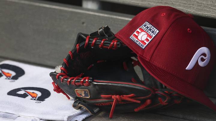 Jul 25, 2025; Bronx, New York, USA; A detailed view of a Hall of Fame patch on a Philadelphia Phillies hat resting in the dugout during the second inning against the New York Yankees at Yankee Stadium. Jul 25, 2025; Bronx, New York, USA; A detailed view of a Hall of Fame patch on a Philadelphia Phillies hat resting in the dugout during the second inning against the New York Yankees at Yankee Stadium.