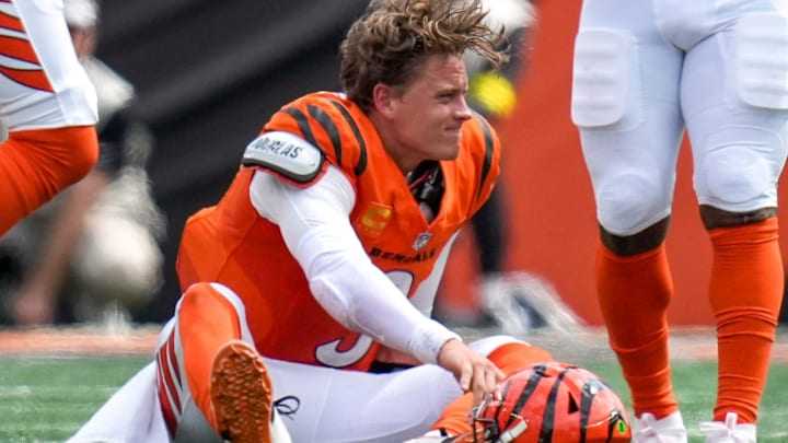 Cincinnati Bengals quarterback Joe Burrow (9) is injured on a play in the second quarter against Jaguars Cincinnati Bengals quarterback Joe Burrow (9) is injured on a play in the second quarter against Jaguars