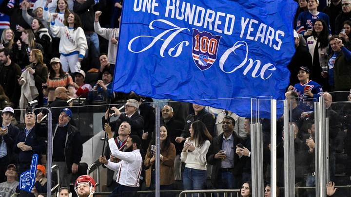 Nov 16, 2025; New York, New York, USA; General view of a flag being waved by New York Rangers staff during the second period against the Detroit Red Wings at Madison Square Garden. 