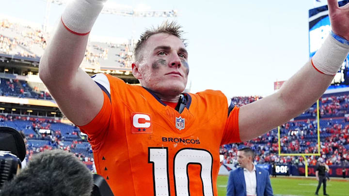 Oct 19, 2025; Denver, Colorado, USA; Denver Broncos quarterback Bo Nix (10) celebrates after the win against the New York Giants at Empower Field at Mile High. Mandatory Credit: Ron Chenoy-Imagn Images Oct 19, 2025; Denver, Colorado, USA; Denver Broncos quarterback Bo Nix (10) celebrates after the win against the New York Giants at Empower Field at Mile High. Mandatory Credit: Ron Chenoy-Imagn Images
