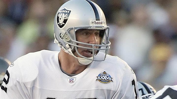 Jan 26, 2003; San Diego, CA, USA; FILE PHOTO; Oakland Raiders quarterback Rich Gannon (12) in action against the Tampa Bay Buccaneers during Super Bowl XXXVII at Qualcomm Stadium. The Bucs defeated the Raiders 48-21. Mandatory Credit: MPS-Imagn Images