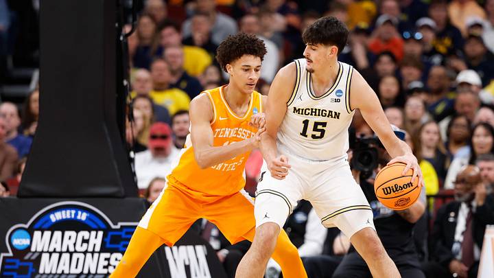 Mar 29, 2026; Chicago, IL, USA; Michigan Wolverines center Aday Mara (15) drives against Tennessee Volunteers forward Nate Ament (10) in the first half during an Elite Eight game of the Midwest Regional of the men's 2026 NCAA Tournament at United Center. Mandatory Credit: Kamil Krzaczynski-Imagn Images Mar 29, 2026; Chicago, IL, USA; Michigan Wolverines center Aday Mara (15) drives against Tennessee Volunteers forward Nate Ament (10) in the first half during an Elite Eight game of the Midwest Regional of the men's 2026 NCAA Tournament at United Center. Mandatory Credit: Kamil Krzaczynski-Imagn Images