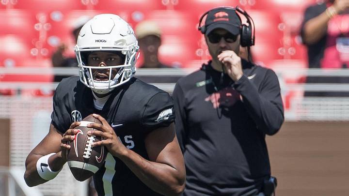 Arkansas Razorbacks quarterback KJ Jackson (7) rolls out to pass during the spring game at Razorback Stadium. Arkansas Razorbacks quarterback KJ Jackson (7) rolls out to pass during the spring game at Razorback Stadium.